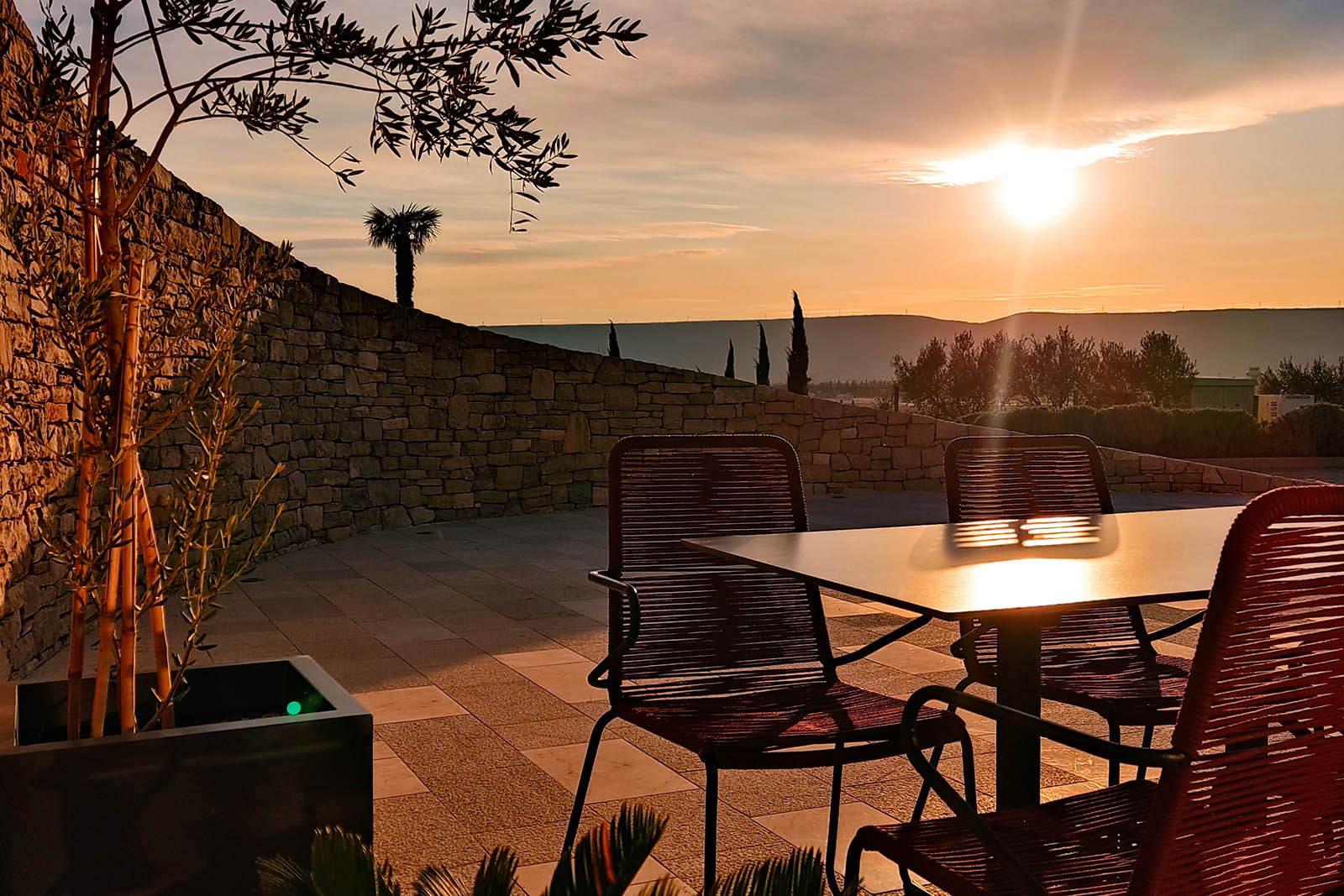 Rooftop dining table set for sunset at Hotel Bulevar