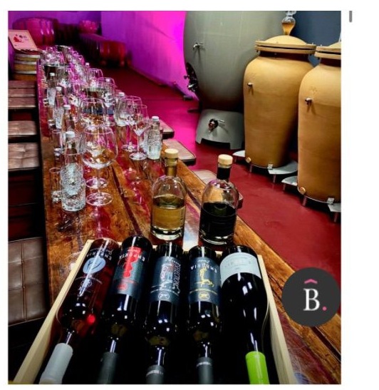 A tasting table set with Emporia wines inside the estate's winery